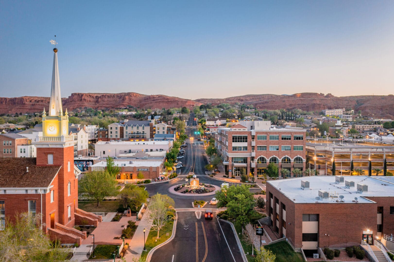 A view of the city from above at dusk.